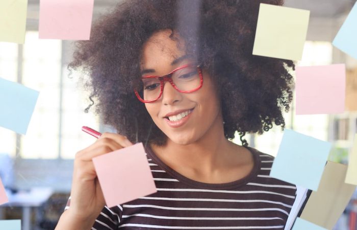 web designer working with post it notes